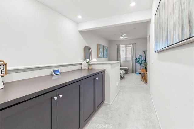 bathroom with baseboards, a ceiling fan, and recessed lighting