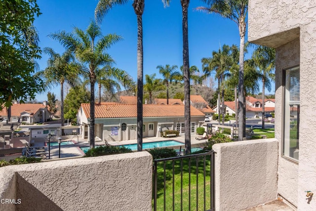 balcony with a residential view and a patio