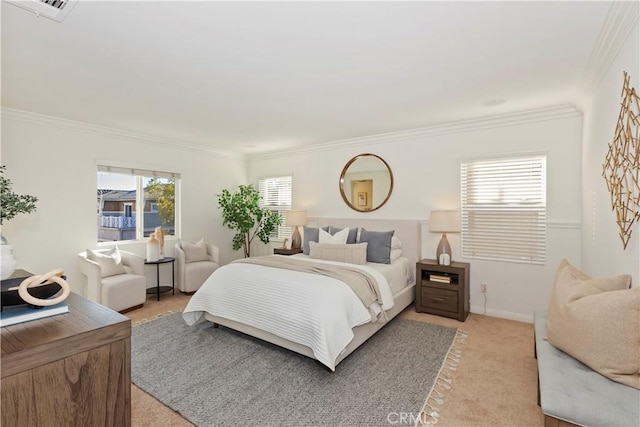 bedroom featuring light carpet, ornamental molding, visible vents, and baseboards