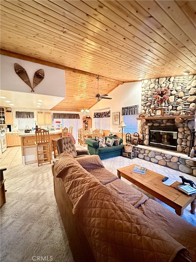 living area with wood ceiling, light carpet, vaulted ceiling, and a stone fireplace