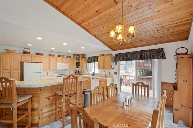 dining area featuring light carpet, lofted ceiling, wooden ceiling, a notable chandelier, and recessed lighting