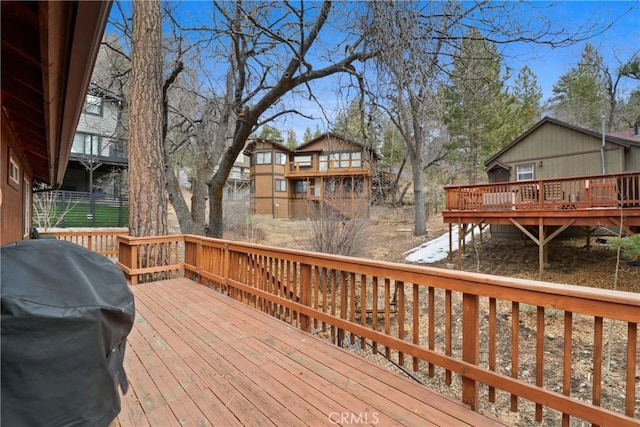 wooden terrace with grilling area