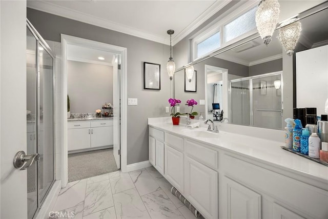 bathroom featuring a stall shower, baseboards, ornamental molding, marble finish floor, and vanity