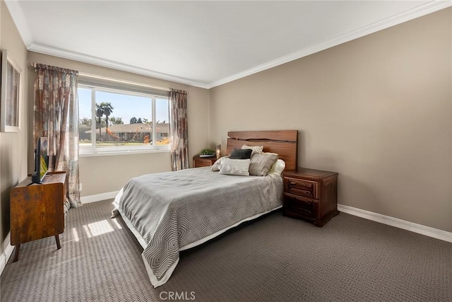 bedroom featuring ornamental molding, carpet, and baseboards