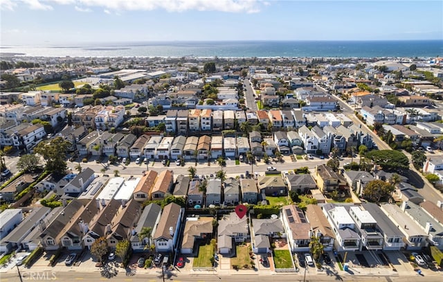 aerial view with a water view and a residential view