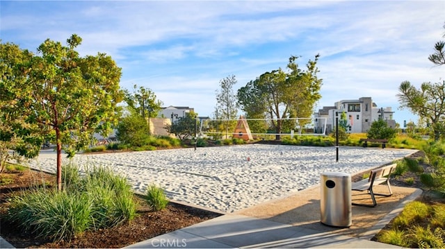 view of home's community featuring volleyball court