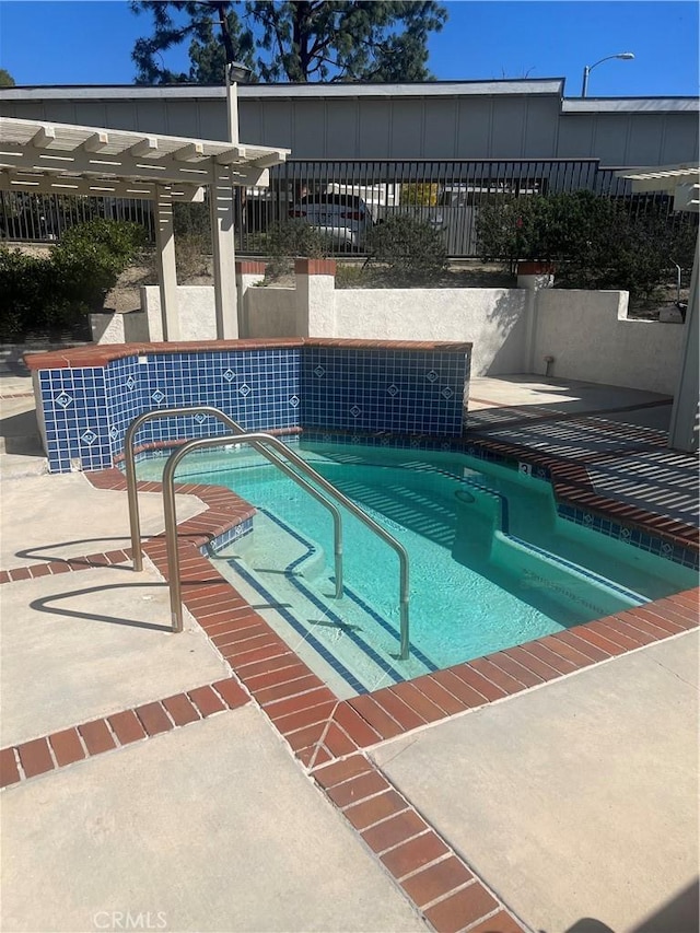 25614 Mont Pointe Unit 3D, Lake Forest, CA 92630 - view of pool with a swimming pool, a patio area, and a pergola