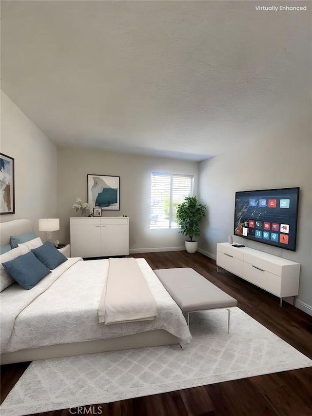 25614 Mont Pointe Unit 3D, Lake Forest, CA 92630 - bedroom featuring baseboards and wood finished floors
