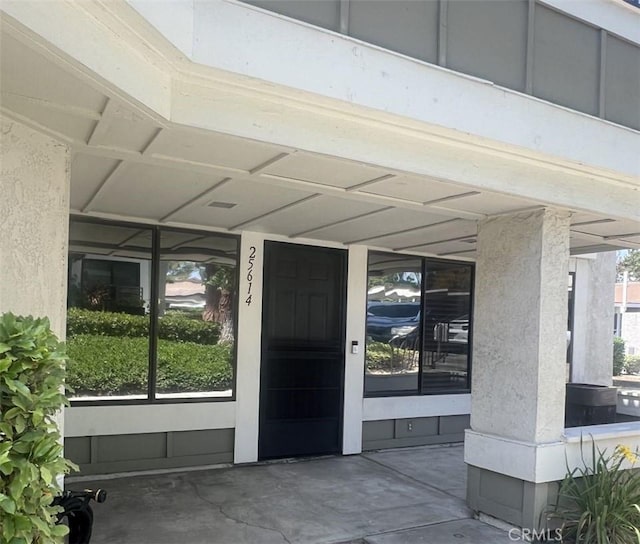 25614 Mont Pointe Unit 3D, Lake Forest, CA 92630 - view of exterior entry with stucco siding