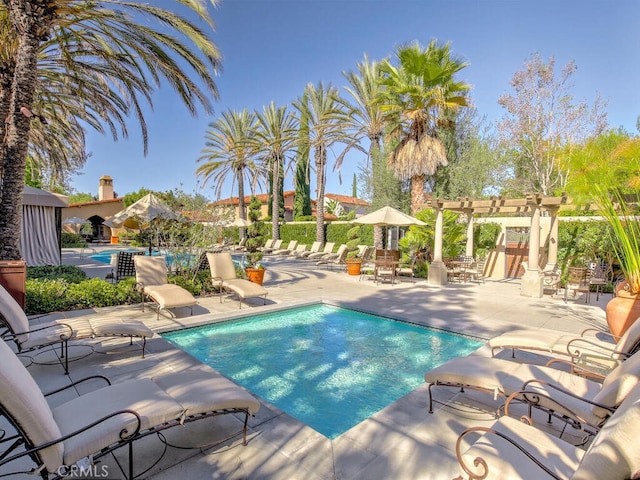 community pool featuring a patio area and a pergola