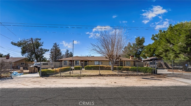 ranch-style house with a fenced front yard