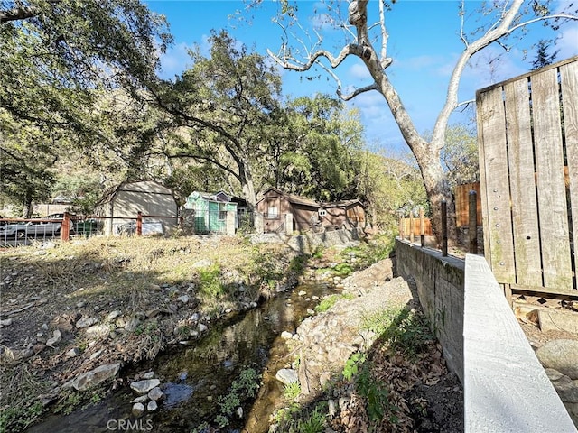 view of yard featuring fence