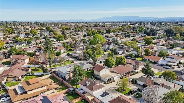 bird's eye view featuring a residential view and a mountain view