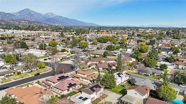 drone / aerial view with a residential view and a mountain view