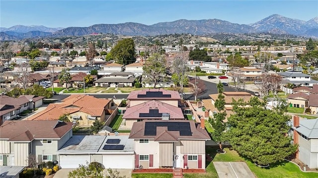 aerial view featuring a residential view and a mountain view