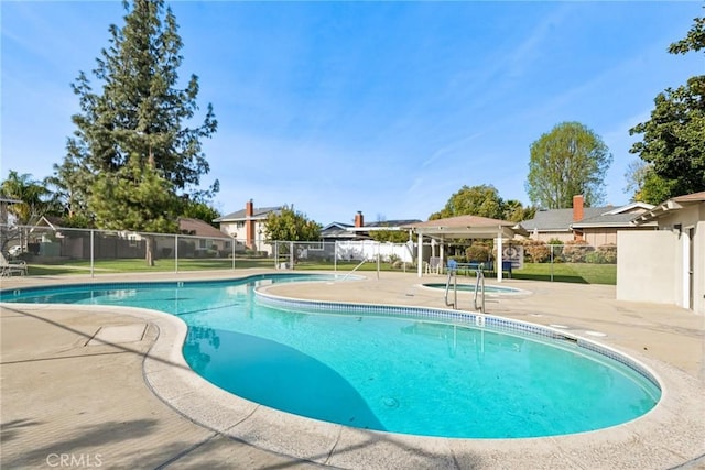 view of pool with a fenced in pool, fence, a gazebo, and a patio