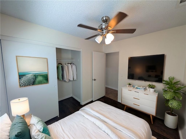 bedroom with a closet, visible vents, ceiling fan, and a textured ceiling