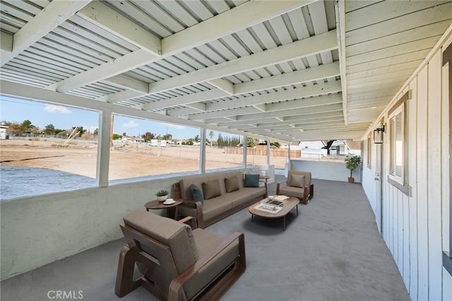 view of patio featuring fence and outdoor lounge area