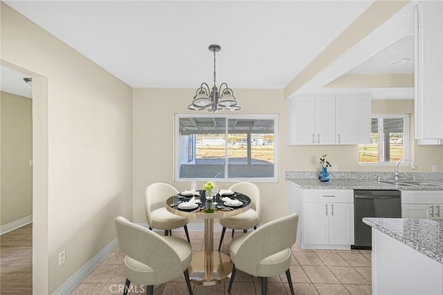 dining room with baseboards, light tile patterned flooring, and a notable chandelier