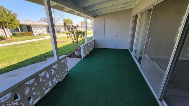 unfurnished sunroom featuring a healthy amount of sunlight