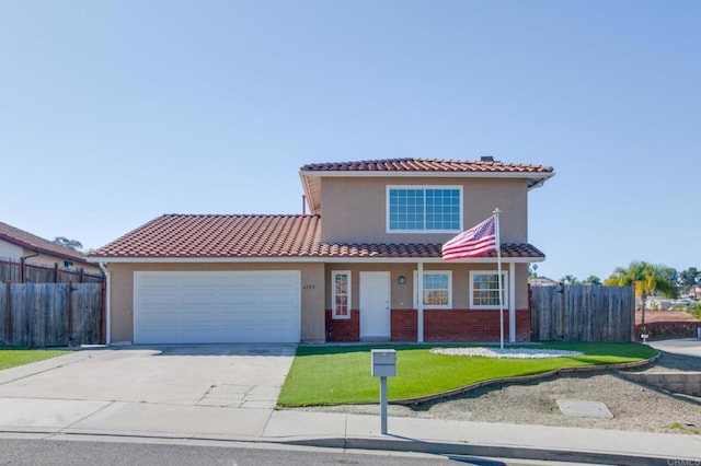 view of front of house featuring a garage, fence, a tiled roof, concrete driveway, and stucco siding