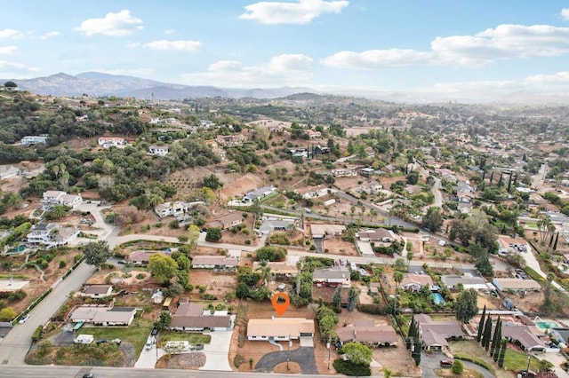 bird's eye view featuring a residential view and a mountain view