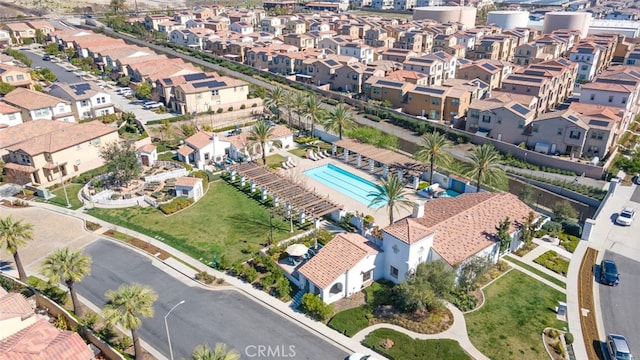 birds eye view of property with a residential view