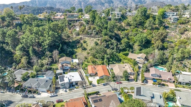 birds eye view of property with a residential view and a mountain view