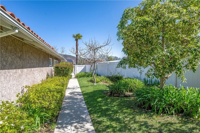 view of yard with fence