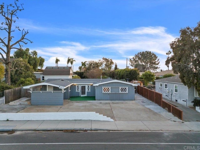 view of front of home with fence