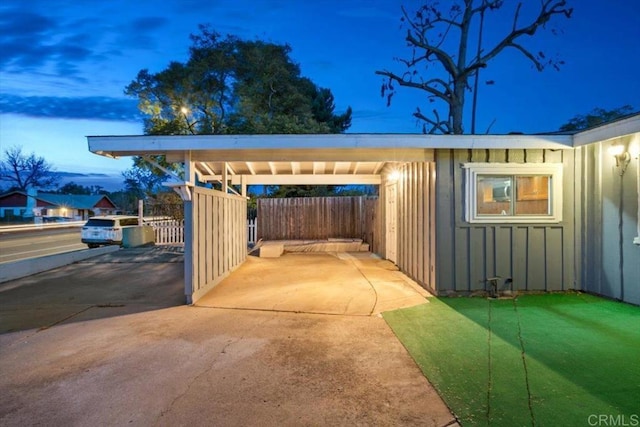 exterior space with fence and driveway