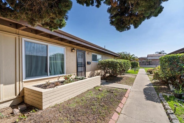 view of front of house featuring stucco siding