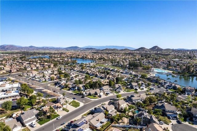 aerial view with a residential view and a water and mountain view