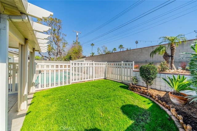 view of yard featuring a fenced backyard