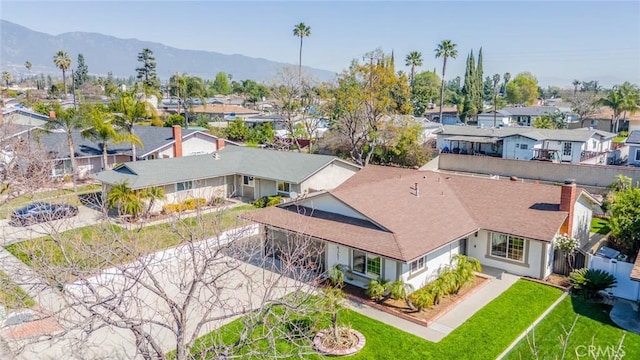 birds eye view of property featuring a residential view and a mountain view