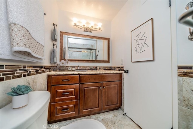 bathroom with a wainscoted wall, tile walls, vanity, and walk in shower