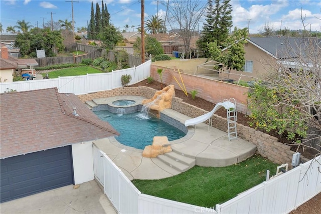 view of pool with an in ground hot tub, a water slide, a fenced backyard, and a fenced in pool