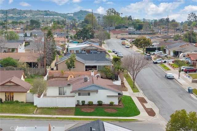 birds eye view of property with a residential view