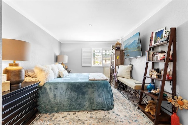 bedroom with wood finished floors