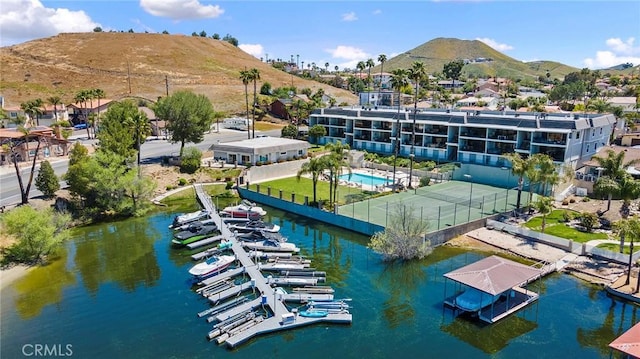 bird's eye view with a water and mountain view