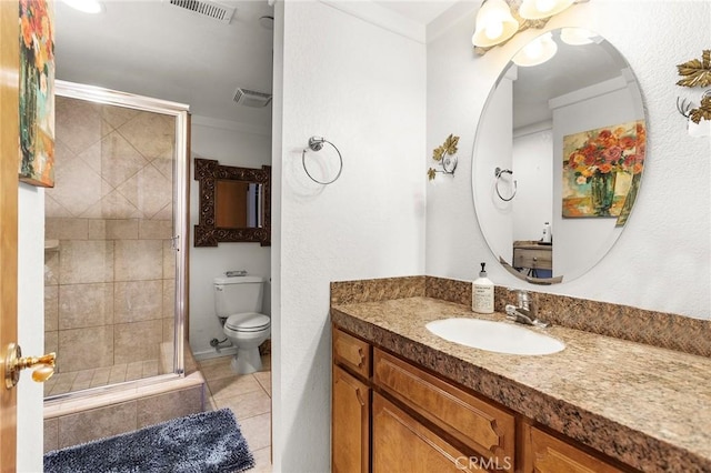 full bathroom featuring tile patterned flooring, toilet, vanity, visible vents, and a stall shower