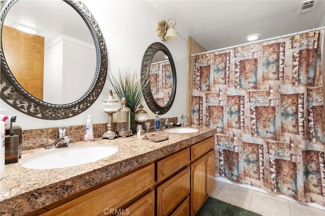 22570 Bass Pl Unit 7, Canyon Lake, CA 92587 - bathroom featuring tile patterned floors, double vanity, visible vents, and a sink