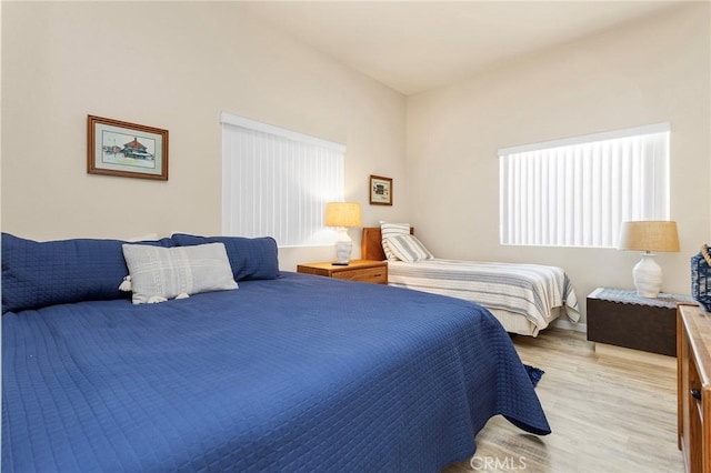 bedroom featuring light wood-type flooring