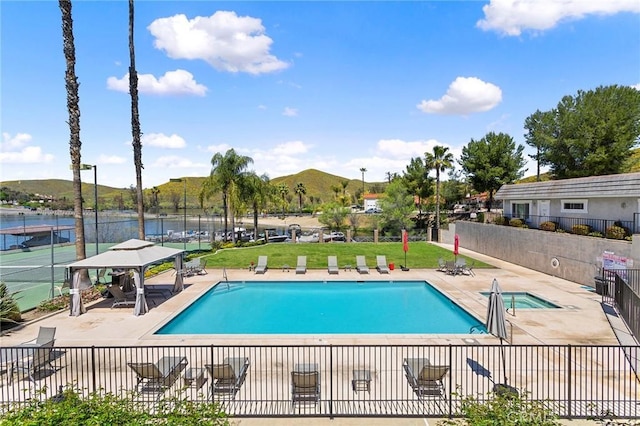 22570 Bass Pl Unit 7, Canyon Lake, CA 92587 - community pool featuring a yard, a patio, a water and mountain view, and fence