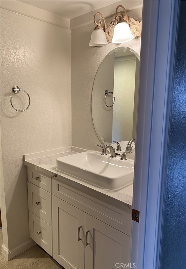 22570 Bass Pl Unit 7, Canyon Lake, CA 92587 - bathroom featuring tile patterned floors, vanity, and a textured wall