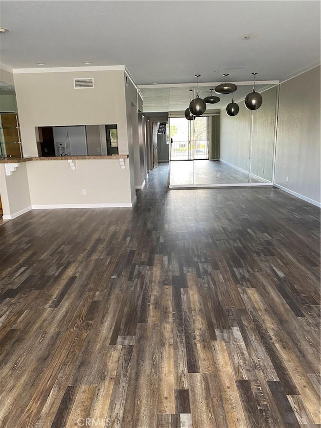22570 Bass Pl Unit 7, Canyon Lake, CA 92587 - unfurnished living room featuring baseboards, wood finished floors, visible vents, and ornamental molding