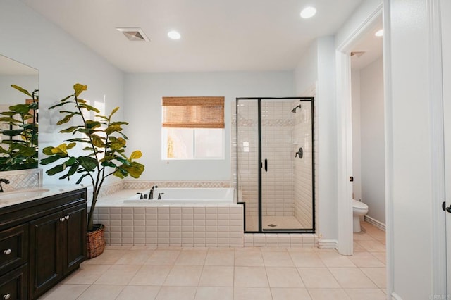 bathroom featuring a stall shower, visible vents, toilet, tile patterned floors, and a bath