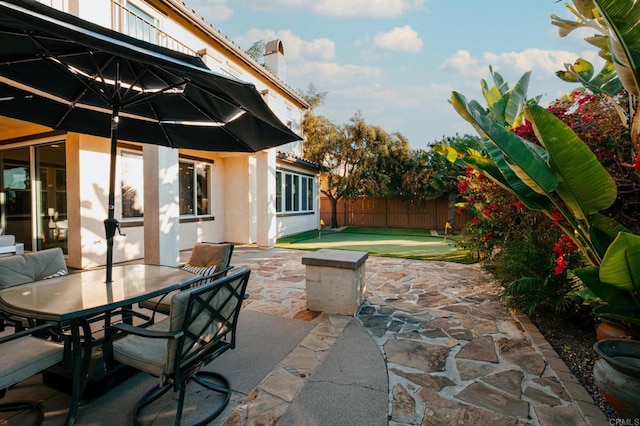 view of patio / terrace with outdoor dining space and a fenced backyard