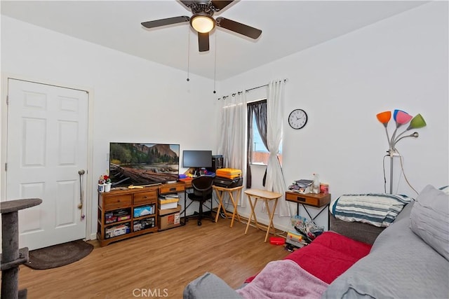 home office featuring ceiling fan and wood finished floors