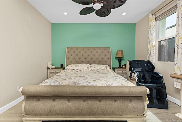 bedroom with recessed lighting, ceiling fan, light wood-style flooring, and baseboards